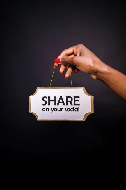 Sticky notes filled with holiday marketing ideas for Christmas social media and email campaigns.